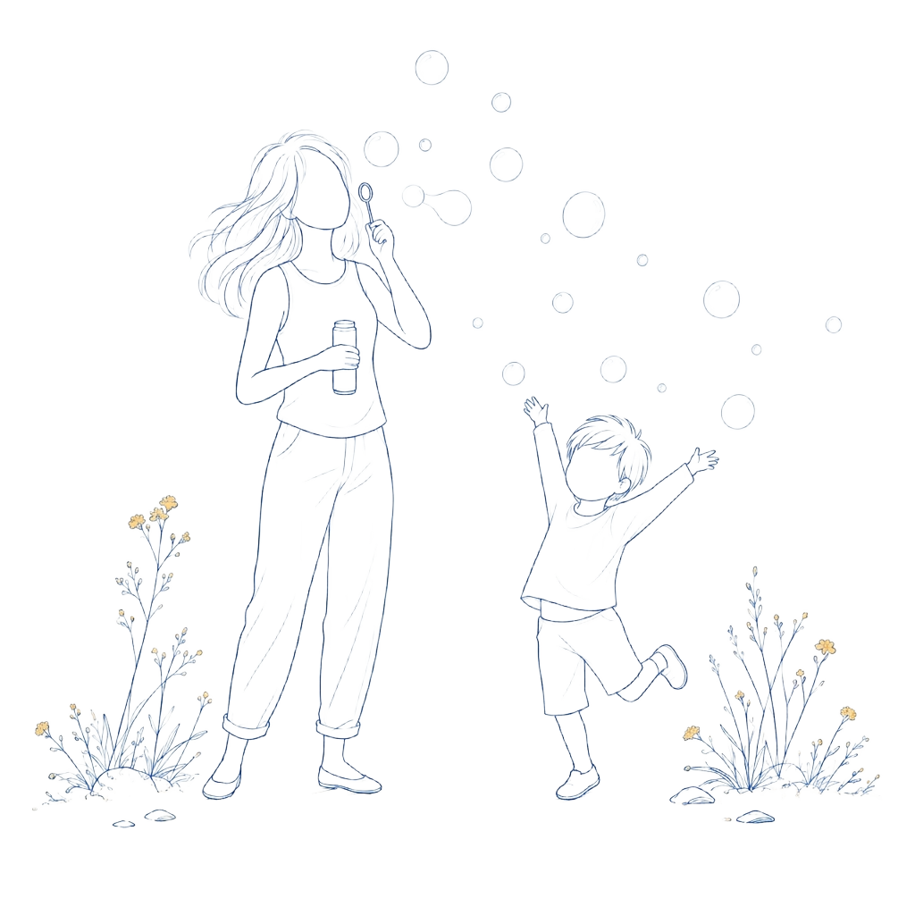 Parent and child playing with bubbles